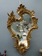 A gilded mirror with a dragon