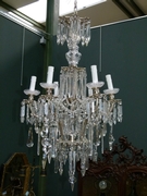 A bronze silverplated  and crystal lamp.