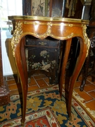 A nice quality Napoleon III table with gilded bronze and marble top.