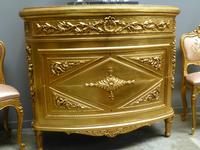 a gilded wood commode