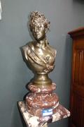 A bronze buste of a lady by Leopold Harzé