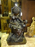A bronze sculpture by G. Debry.