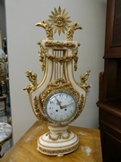 A huge French Louis 16 style gilded bronze and carrera marble clock 