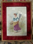 A painting of a lady on a porcelain(faience) plate by Lucien Levy.